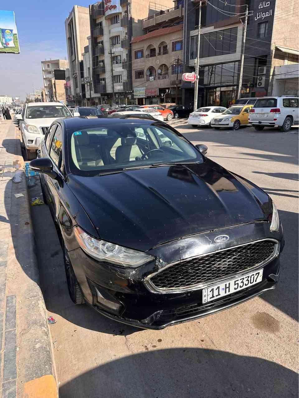 فورد فيوجن 2019 SE
 ماشية 175 الف كيلو متر
السيارة گير و مكينة كلشي مكفول بيها 
1500 تيربو 
السيارة حادثها جاملغ خلفي و بيها كم قطعة ف ابيع حزام و السونار موجود
فول مواصفات عدا الفتحة
كشنات جلد، تدفئة
تبريد قطعتين، هاند بريك بصمة،تشغيل عن بعد،رادار، حساسات خلفية، تحديد مسار، شفتات ستيرن، تحكمات ستيرن، كشنات امامية كهرباء، كشنات خزن ميموري ، جام رباعي اوتو، شاشة اعطال، كار بلي، مري قلاب، auto start/stop

رقم بغداد و بأسمي تحويل ثاني يوم

نقصها
غاز للتبريد، دعامية امامية, بطاين امامية،ماطور الauto start/stop
الباقي كلشي كامل ومكفول

السعر 103 ورقة و بيها مجال 
مكاني بغداد الغدير
*********** بغداد, العراق
