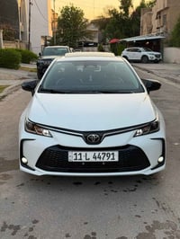 كورلا هايبرد الشكل الخليجي 2025 رقم بغداد باسمي ماشيه(9000)الاف فقط ال...