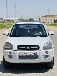 توسان خليجي 2009كير ومحرك وحدادية كفالة تخم تاير جديد رقم انكليزي تحوي...