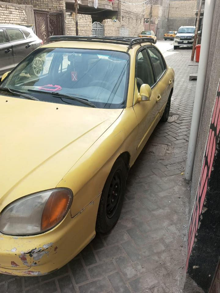 السلام عليكم
سوناتا موديل 2001خصوصي وليس أجره 
رقم بغداد كير ومحرك كورله وبيها نقوصات كما واضح في الصور للاتصال *********** العنوان بغداد الشعب علمن أنا مكلف في النشر
