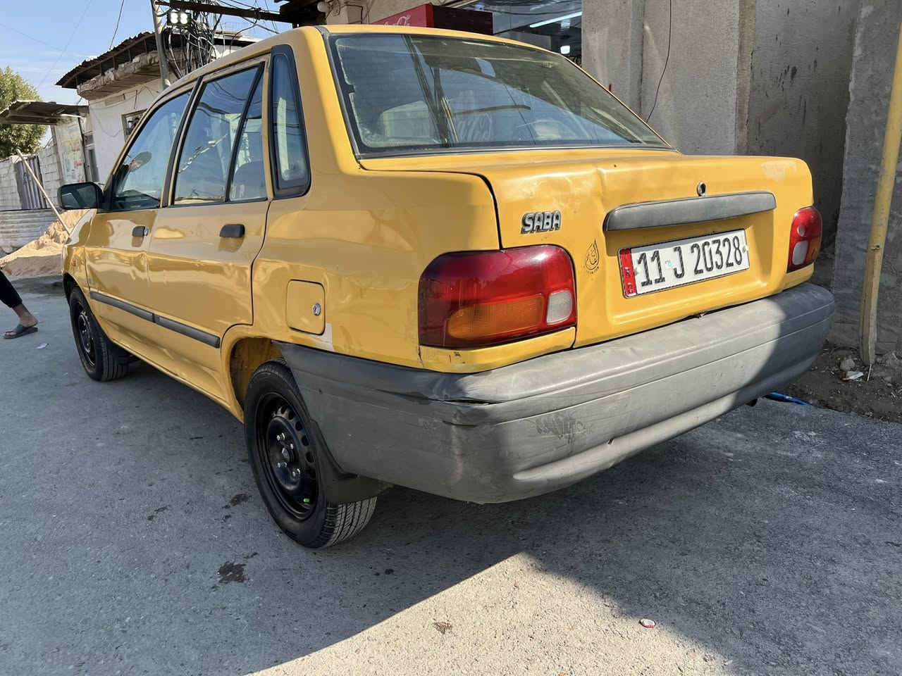 السلام عليكم سايبه مديل ٩ كير مكينه خير من الله شوااصي نضاف  صدر امامي خلفي تخم تاير كهربائيات شغاله سياره متعوب عليهه هيه غرامه مصفره  السعر ٢٦وبيهه مجال بصيط العنوان التاجيات قرب المرور الهاتف ***********
