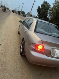 لانسر ٢٠١٠ • مكينة وكير • ضربه خلفيه