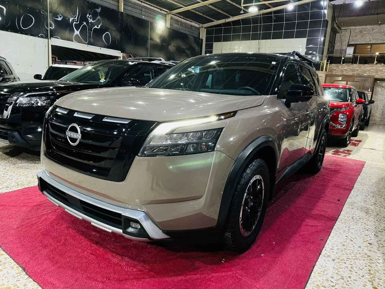 🔊(فرع كركوك) 

📌 Nissan Pathfinder 2023 Rock Creek 📌

♂️عداد المسافة 26308 mile

💵 (السعر/ 26000  $)

♦️ المواصفات :

بصمة تشغيل
بصمة ابواب
تشغيل عن بعد(Remote Start)
صندوق شفط كهربائي 
رادار امامي (تحديد مسار)
رادار جانبي (نقاط عمياء)
رادار خلفي (تحذير من الاصطدام)
حساسات امامية+ خلفية
دفع رباعي 4WD
اوتو بارك Auto Park
كاميرات 360°
كشنات جلد
كشنات ميموري
كشنات تدفئة
تبريد قطعتين لمس
تحكم وضعيات القيادة...Drive Modes 
شفتات + تحكمات استيرن 
هيتر استيرن
Apple Car Play
Android Auto 
هاند بريك بصمة
اوتو هولد Auto Hold
اوتو ستارت Auto Start
اوتو ستوب Auto Stop 
مانع انزلاق+ABS
شاشة كبيرة لمس+كاميرا
منافذ AUX+USB
وبقية المواصفات المعروفة

(العنوان/كركوك شارع المعارض)
              - - - - - - - - - - - - - - - - - 

♦️للاتصال/

ابو محمد
*********** 

فيصل
***********
