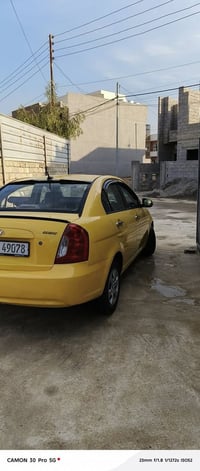 هونداي اكسنت للبيع  موديل2010   وارد امريكي   رقم بغداد بأسمي  گير مكي...