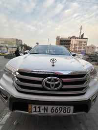 تويوتا 2019 ابيض رقم بغداد  سنويه وهزه جديده كويتي ماشيه 113 الف بسمي ...