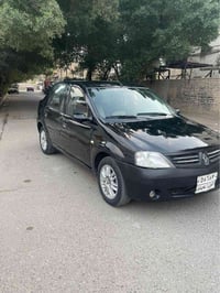 رينو لوكان 2009 رقم سليمانيه قديم  لون اسود  كير عادي  سياره مصبوغه عا...