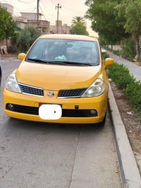 نيسان تيدا موديل 2008   معمّرة  لون اصفر مصبوغه عام  محرك جديد كير جدي...