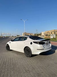 اوبتيما ٢٠١٥ • ماشيه ٩٦١٠٠ • ابيض صدفي