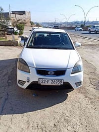 كيا ريو  موديل 2012 وارد كوري  رقم اربيل الدولي كابون بانزين  كير ومحر...