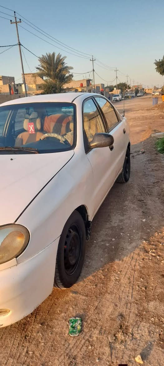 السلام عليكم  من رخصه مدير الاكروب المحترم دايو  لانوس موديل ٢٠٠٠  محرك ١٦٠٠  كير ومكينه مكفولات لا بخار ولا تنقيص  كير عادي  صدر جديد  تاير جديد  باتري جديد ما بيهه نقص  السعر ٣٥ وبيه مجال  سنوية لل ٢٠٢٧  رقم بغداد   عد صاحبهه الشرعي  عنوان واسط الزبيديه وهذا‏‪***********‬‏  ابو حيدر
