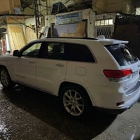 جيب كراند شيروكي موديل 2017 لون ابيض ثلجي ادوات حديده السيارة  متوئم ك...