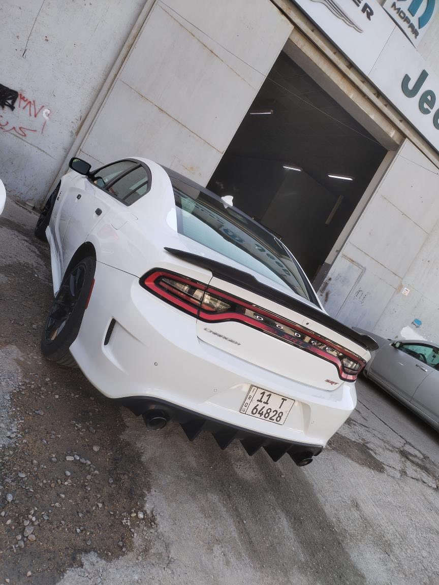 سلام عليكم دوج جارجر 2016 فول مواصفات حادث جاملغ ايسر وباب سايق بدون ايرباك السعر 185 بيه مجال قليل 
مكاني بغداد جديده هاذ ***********
