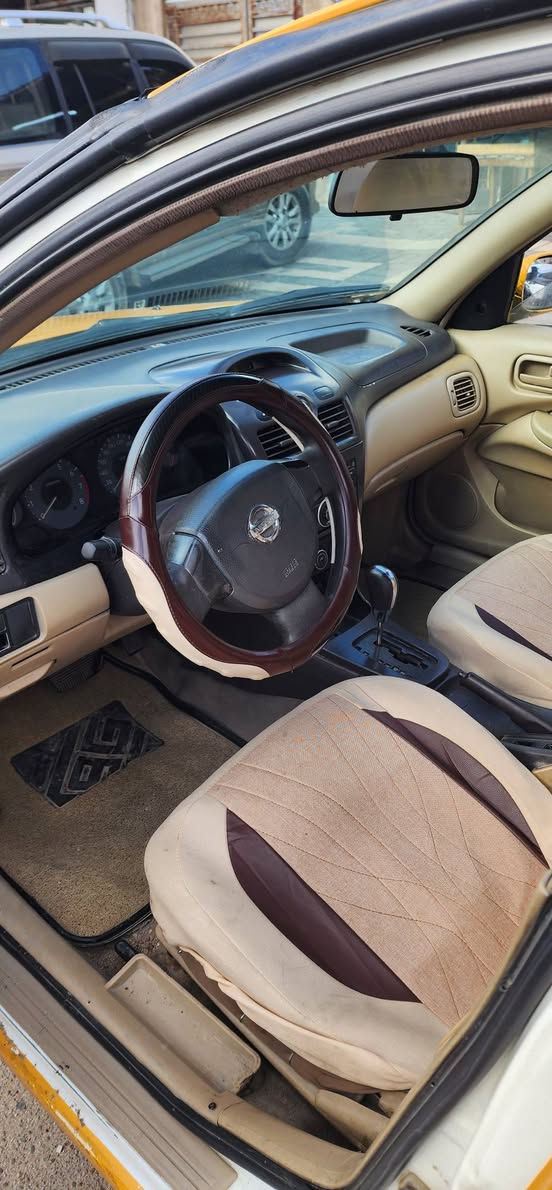 السلام عليكم نيسان سني 2009 خليجي تكسي اصل ابيض لسعر 75$ مكان بغداد التاجيات ***********
