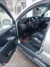 سياره سبورتج للبيع موديل 2009 محرك 2000 محرك كير خير من الله تبريد ثلج...