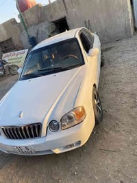 للبيع اوبتما موديل 2004 رقم بغداد باسمي ماناقصه اي شي مصبوغه حزام للجم...