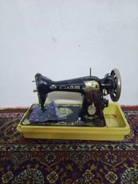 مكينة خياطة • شغاله • عليها ختم