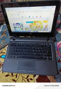 حاسبة HP • محتاجة بطارية • مقفلة