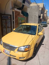 كيا اسبكترا موديل ٢٠٠٨ وارد رقم بغداد انكليزي بسمي مثل مااشوفونها بلصو...