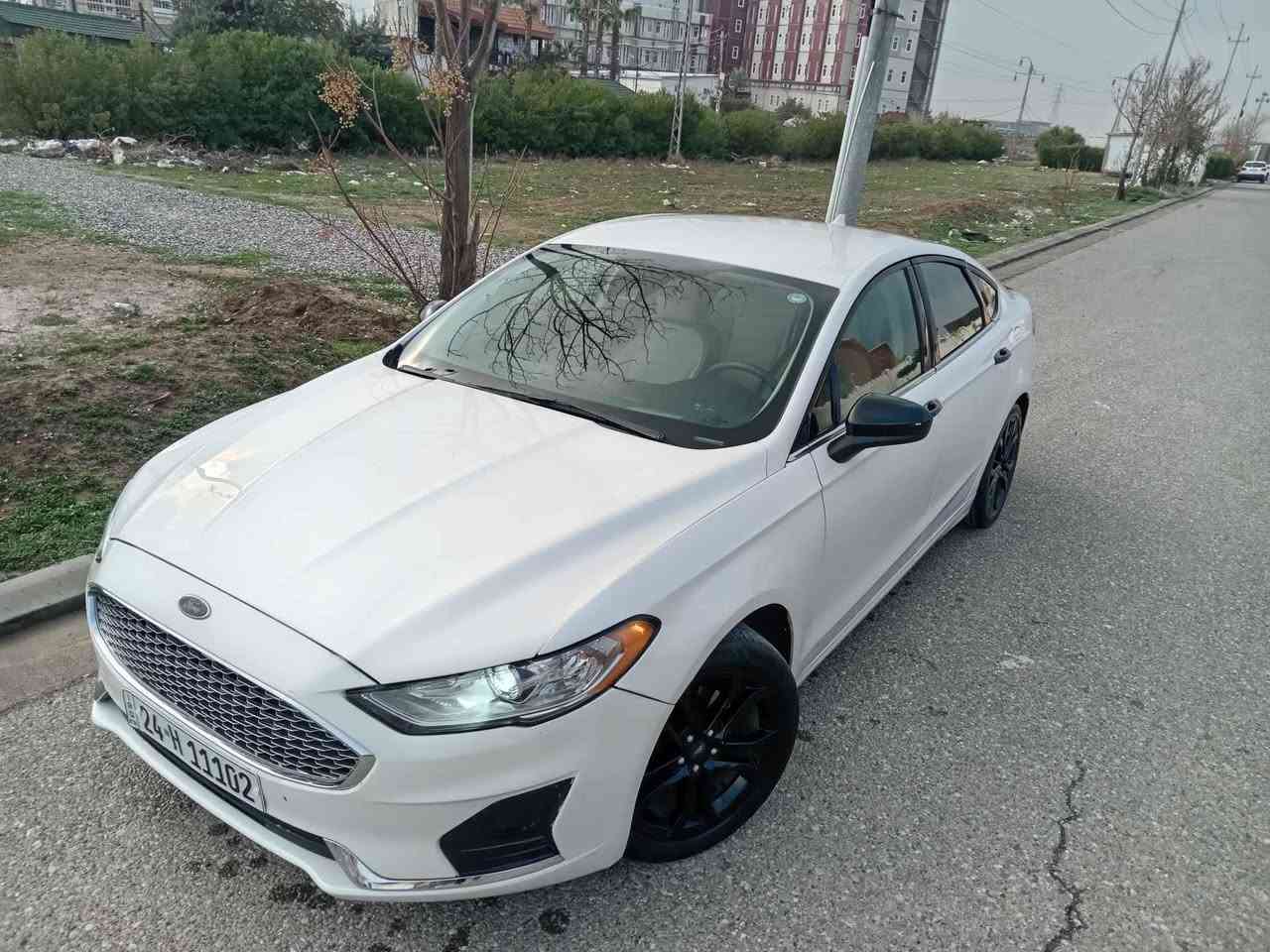 للاستفسار *********** فورد فيوجن 2020 لون ابيض صدفي مميز💥 ماشي ٦٠ الف بيها جاملغ سكن صبغ وباب  الباقي مكفول كشنات كهربائي نص جلد كامرة دوارة شاشة كبيرة رادار امامي رادار جانبي تحديد مسار كروز سرعة بصمة تشغيل ويل كروم بلادي اسود قياس ١٨ محرك كير تبريد كلها بشرط رقم هزة سنوية ٢٠٣٠ وكالة تحويل بشرط منضومة لايت زينون عالي وناصي مكان السيارة اربيل عنكاوا *********** السعر ١١٦ ورقة أربيل, العراق
