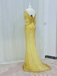 فستان • قياس ٤٠/٤٢ • ملبوس مرة وحدة