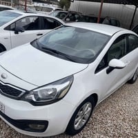 كيا ريو 2014 خليجي  رقم كربلاء محرك 1600   بدون صبغ بيها بارد فقط  الس...