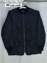 قمصله(PLASTIC lSLAND)سوبر كريم   القياس  L تلبس وزن 80 ألون اسود فحم ا...