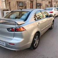 للبيع لانسر قرش موديل 2015 وارد خليجي محرك 2000 السياره جديده ماشيه 97...