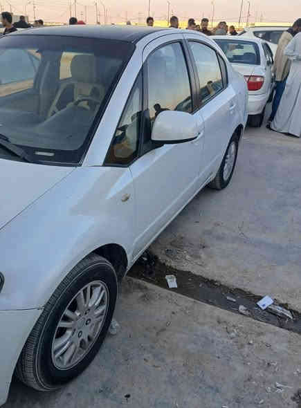 السلام عليكم ورحمة وبركاته 
سيارة ساسوكي ياباني موديل 2012 رقم واسط نكليزي مشروع وطني سنوية ل 30 سيارة مكفوله من ي حادث حتى من معجون بيه رشات صبغ اثر تكشير جاهزة سيارة مكاني كوت سعرها 70 وبيه مجال *********** لشراي يخابر وبي خير ويدلل بغداد
