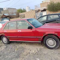 أحمر • ١٩٩٠ • الديوانيه