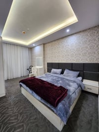 كوين تاورز مربع الذهبي • شقة ١+١ • مفروشة