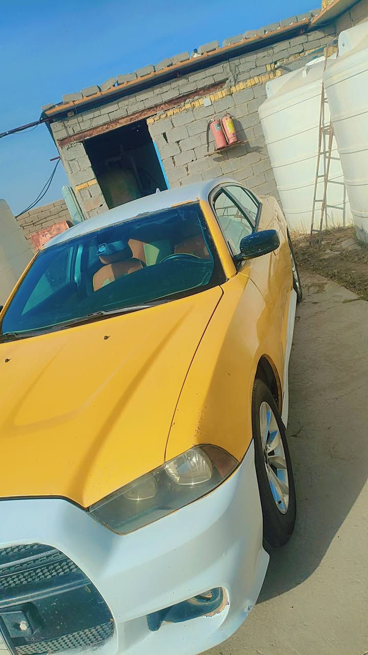 شارجر للبيع موديل 2011 جاهزه للعمل مابيهه نقص للاستفسار ***********
