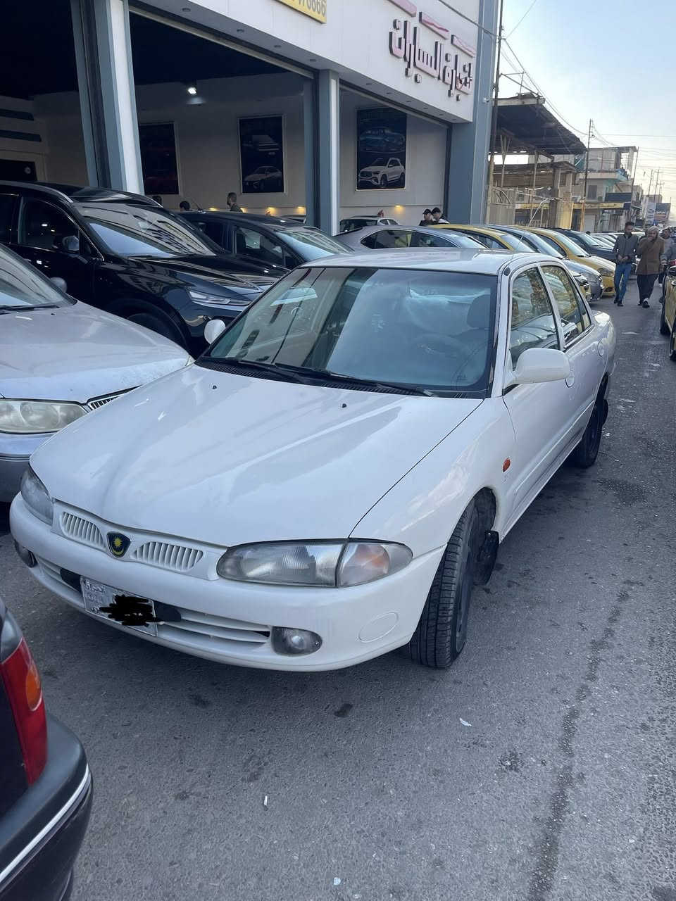 السلام عليكم
بروتون للبيع 
2002استيراد خاص 
گير اوتوماتيك دشبول ايرباك
ضرر فقط شبر بچاملغ الخلفي بس الچاملغ نصه اطوز 
جامات امامية كهرب 
محرك 1500 جديد گصة 
ريموت قفل فتح صندوق كهرب 
ريموت تشغيل اطفاء عن بعد 
 شاشة اندرويد كامرة خلفية دبل USB بالدشبول للشحن 
مرايات كهرب مع هيتر 
بلاجكتورات امامي مال شركة 
سيارة كلشي بيها شغال باستثناء التبريد 
طخم…باتري كله جديد 
رقمها صدامي  سيارة باسمي معاملتها واصلة الهزة 
والي يشتريها هو يكمل معاملتها  وبالهزة اني اضمنها 
والغرامات اني ادفعها 
للاستفسار اكثر ***********
السعر 55 ورقة قفل
