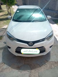 سياره كورلا للبيع فقط وارد أمريكي ضررها الدعاميه الخلفيه رقم بغداد بسم...