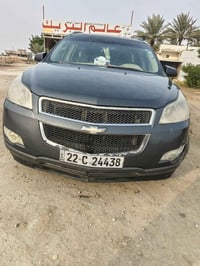 شوفر ليت ترافرس موديل 2009 لون نفطي مكفوله بس باب الجنطه بي شويه صبغ ر...