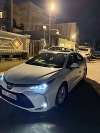 كورلا خليجي (بانزين)فول وكالة ساز موديل 2021 ماشيه 55الف  مكفوله من ال...