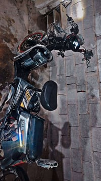 دراجه كهربائيه • نضيفه • بطاريات محتاجة فحص