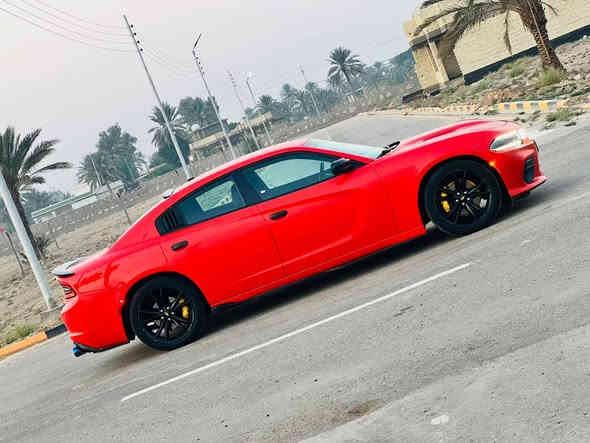 جارجر 2022  اصل ماشيه٥٠ الف حقيقي رقم سليمانيه بااسمي صور الضرر مرفقه بالمنشور فقط بنيد بدون دواخل عالفحص ابيعك وباامريكا بيها باب وجاملغ كلير وارجع واكول كلير فقط ومسؤول على كلامي بدون فتح بدون معجون بدون حادث فقط كلير السيارة جديدة بمعنى الكلمة استخدام شخصي 
داخلها لون احمر 

سياره جديده بمعنى الكلمه

المحرك : V6.  3.6L .

المواصفات :

* جناح خلفي بلادي
* ويل قياس 20 انچ  بلادي تخم تاير جديد
* ستيرن رياضي . 
مقاعد رياضية جلد   . 
* مصابيح أمامية زنون . 
* كشافات الضباب زنون . 
* المصابيح الأمامية مع LED . 
* حساسات . 
* شاشه كبيرة مع نظام ملاحة نفكيشن GPS .
* الشاشة مع اوپشنات SRT . 
* سستم صوت الپاين .
* مقاعد أمامية كهربائية عدد 1 
* مقاعد أمامية وتدفئة . 
* تشغيل عن بعد . *
* محدد سرعة . 
* تلفون بلوتوث . 
* كاميرا خلفية .
* مرايا متحسسة للاضاءة العالية .
* كير شفتر بالستيرن .
السيارة معروضه 218 $وبيها مجال بسيط الشراي يتصل وعيوني اله
***********
