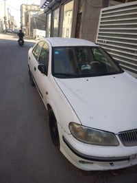 نيسان سني 2008 للبيع محرك 1800 مكفوله محرك وكير مصبوغه عام الضربه موضح...