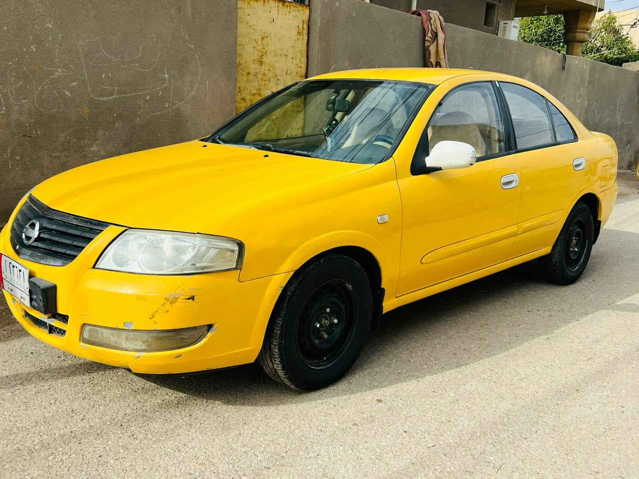 السلام عليكم 
نيسان سني 2008 رقم ديالى بأسمي تحويل ثاني يوم
محرك ابيض 1600 كير اوتو 
سنوية ل2028 مصفرة هيئة وغرامات
السعر 76 وبيها مجال بسيط مكانها ديالى 
للاستفسار ***********
