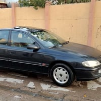 أوميكا بزون • ١٩٩٥ • رقم انكليزي