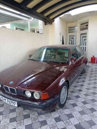 بي ام 735i اصل بليته وسنويه هزه جديده سنويه 29 موديل 91 مكينه 35 بلجيس...