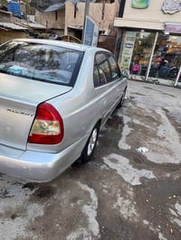 للبيع هيونداي اكسنت2001 رصاصي للاستفسار ‭+964 780 835 1916‬