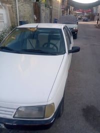 بيجو 2009 كير ومحرك مكفول تبريد شغال مكاني بغداد 07703341350