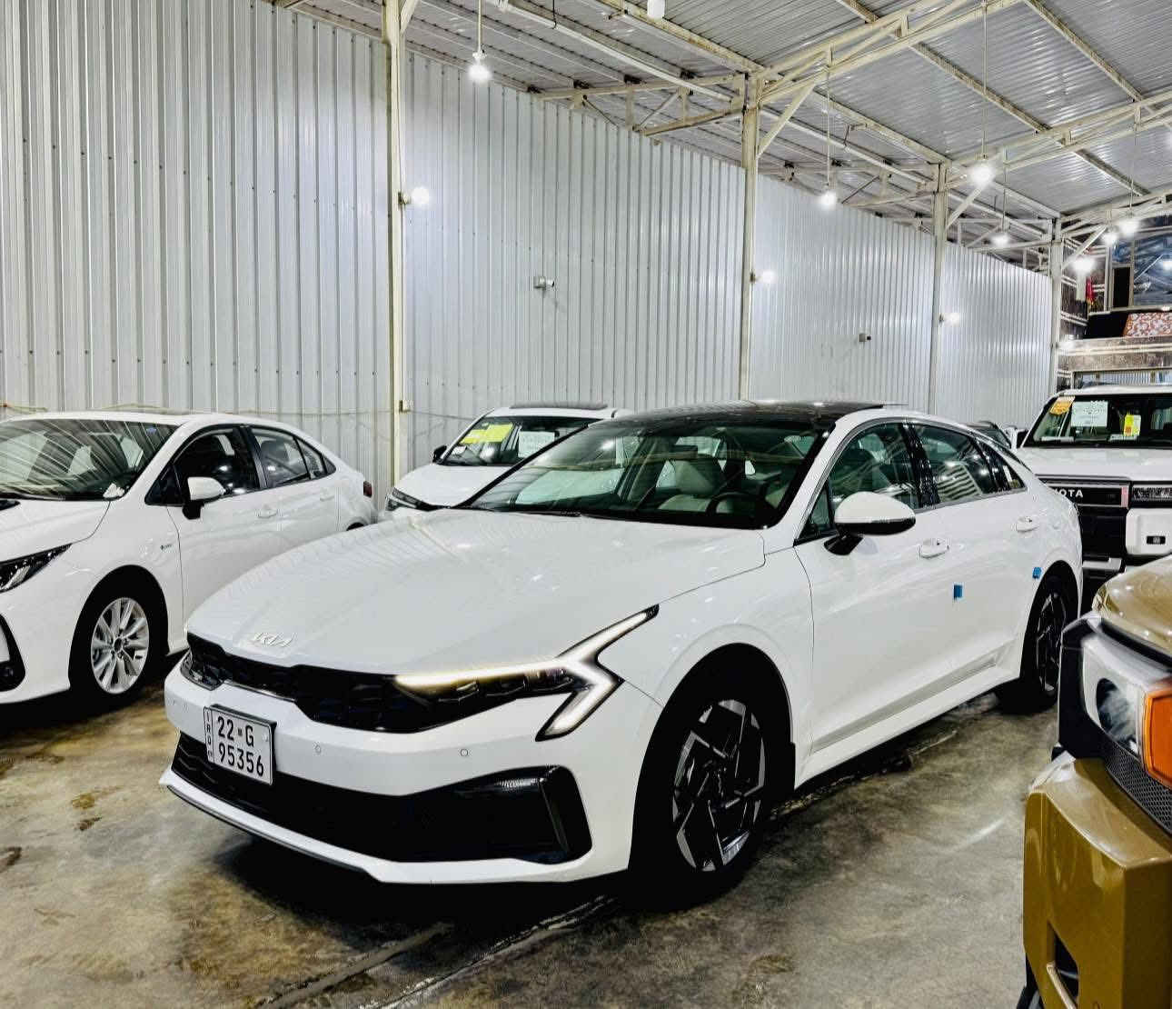 ☑️♥️. مجموعه الملك للتجاره السيارات .♥️☑️⸻

✅نقدم لكن افضل العروض المناسبه لزبائن الكرام 

 🚗 كيا K5        ✅موديل 2024       ✅محرك 2.5 
 
مواصفات خارجية
 • مصابيح أمامية LED مزدوجة (Dual LED)
 • إضاءة نهارية LED
 • كشافات ضباب LED
 • فتحة سقف بانوراما 
 • جنط 18″ ألومنيوم رياضي
 • مصدات و تصميم أمامي وخلفي رياضي
 • مرايا جانبية كهربائية + إشارات LED
 • حساسات أمامية + خلفية

⸻
مواصفات داخلية
 • شاشة ترفيه كبيرة تدعم:
 • Apple CarPlay
 • Android Auto
 • كاميرا خلفية مع خطوط مساعدة
 • شاشة عدادات رقمية / شبه رقمية
 • نظام صوتي عالي الجودة
 • دخول وتشغيل بدون مفتاح (Keyless + Start)
 • مكيف أوتوماتيك
 • تبريد/تدفئة  (حسب الفئة الأعلى)
 • عجلة قيادة متعددة الوظائف (تحكم بالميديا والعداد)
 • منافذ USB / TYPE-C + بلوتوث
 • مساند وسطية أمامية وخلفية
 • عازل صوت ممتاز داخل المقصور

📍العنوان :• بغداد – الكريعات – نهاية شارع المعارض

الاسفسار الاتصال ع الارقام التاليه 

☎️*********** 

☎️***********

☎️***********
