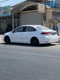 للبيع كورلا ساز خليجي موديل 2022 ماشيه .100 الرقم بغداد الهزه جديده بع...