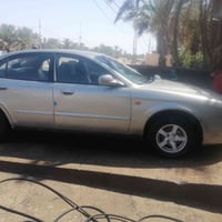 ماكنوس • ٢٠٠١ • خبطه خلفي