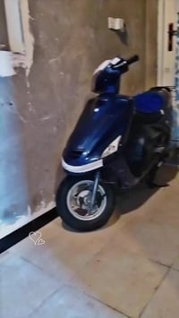 فراشة • ٢٠٠١ • مامفتوحة