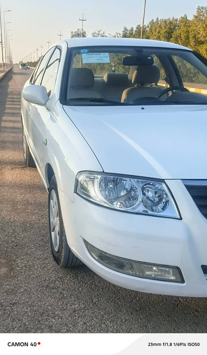 نيسان سني (2013) رقم واسط انكليزي مكفولة كفاله عامه ماعدا الجاملغ الامامي مرشوش اثر  شخط بسيط بدون فتح سياره جديده جداً  مكان السياره كوت مركز المدينة الاتصال على رقم الهاتف ***********
