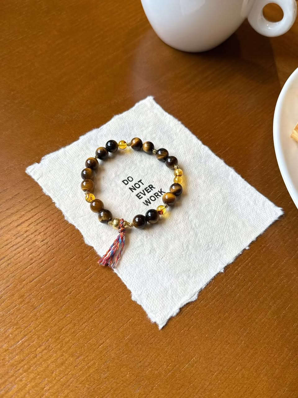 Tiger's Eye Radiance, Amber's Enduring Legacy
We present this unique energy combination bracelet, skillfully combining two natural gemstones—tiger's eye and amber—to create an everyday companion that protects your balance and strength.

✨ Tiger's Eye - Your Shield of Courage
Like the eye of a tiger, its golden light flows.

🌸 Amber - Your Gentle Wings
Sealing within it millions of years of time and the spirit of plants, like a natural miniature painting.

Who is it suitable for?

▸ Those facing challenges who need to enhance their confidence and decisiveness

▸ Those seeking emotional balance and yearning to release stress

▸ Creative workers who need both inspiration and stability

▸ Those who cherish unique natural jewelry and love the stories of nature.

讓這款手鍊陪伴你，在生活的每個場景中，既擁有面對世界的堅韌鎧甲，也保持內心深處的那份柔軟與寧靜。

If you would like this subtle beauty to become your daily companion, write to me 
📩WhatsApp：8613308361107

Don't wait, because a bracelet like this will probably never appear again


**إذا كنت صاحب هذا الإعلان وتريد حذفه لأي سبب، رجاءا أرسل رسالة إلى الدعم الفني**