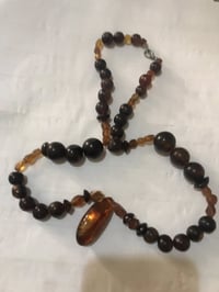 عقد كهرمان • قديم